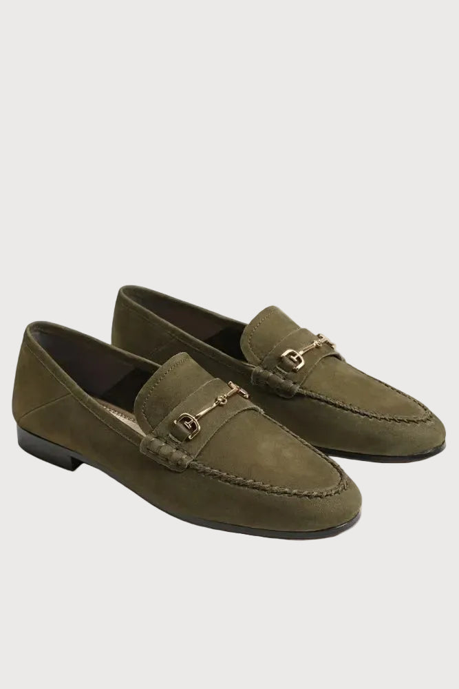A pair of olive green suede penny loafers with gold-tone horsebit hardware, displayed on a clean white background.